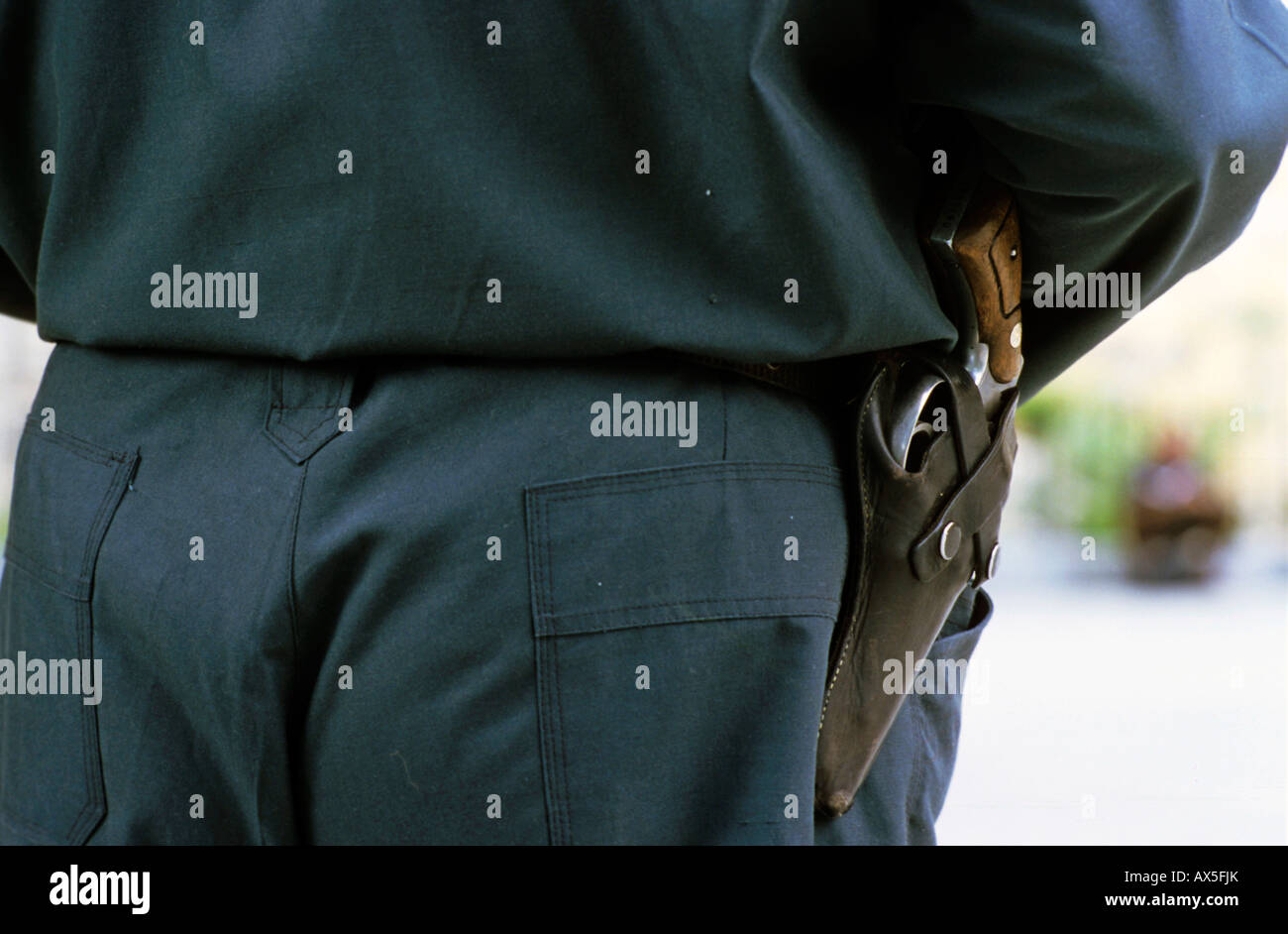 Policeman with revolver, Iran Stock Photo