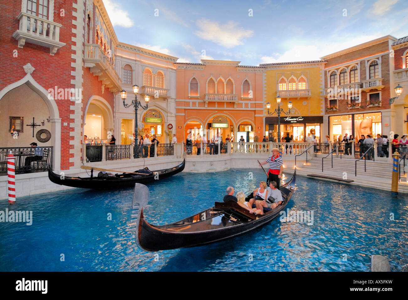 Gondola and tourists under an artificial sky in a recreated Venice, interior of the Venetian Resort Hotel & Casino on the Strip Stock Photo