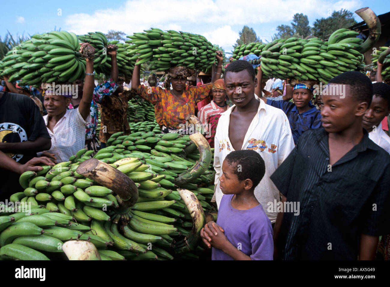 Busy market for cooking bananas in Mwika Village, Kilimanjaro, Tanzania. Stock Photo