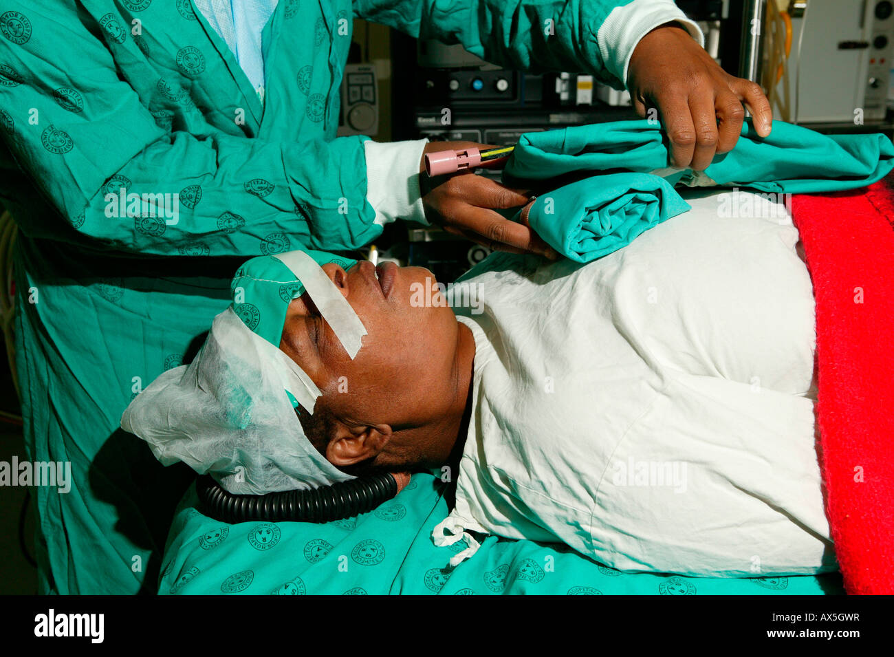 Physician and patient in the operating room after cataract surgery, Pietermaritzburg, South Africa, Africa Stock Photo