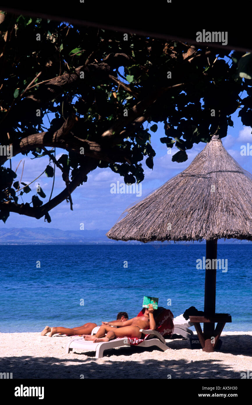 Topless Tourist on South Sea Island Beach in the Fiji Islands Stock Photo -  Alamy