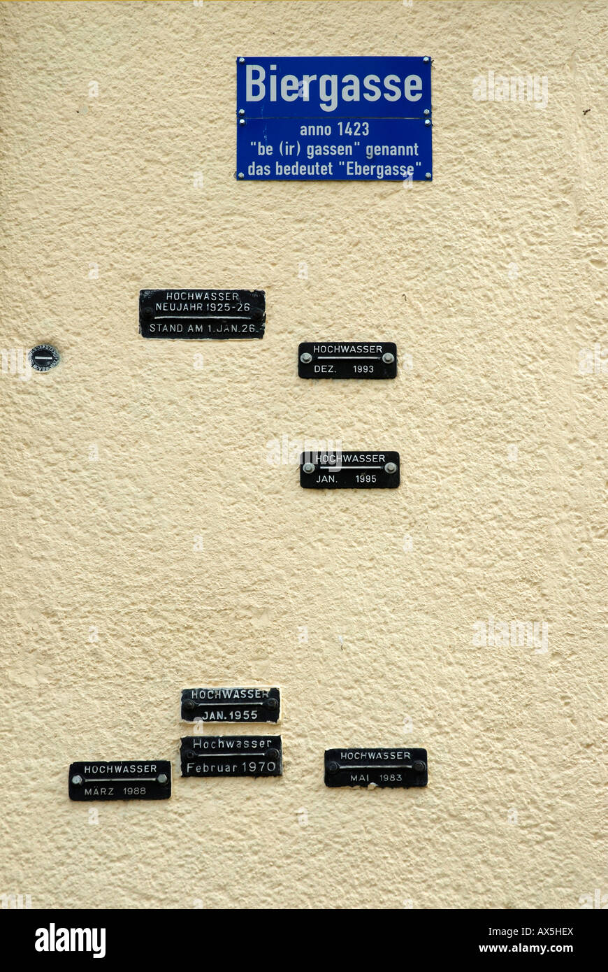 Display showing flood levels over numerous years on a yellow house wall in Bad Breisig along the Rhine River, Rhineland-Palatin Stock Photo