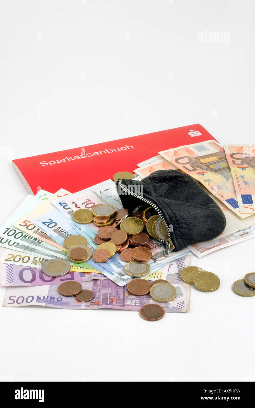 Euro notes and coins, wallet on a bank book Stock Photo