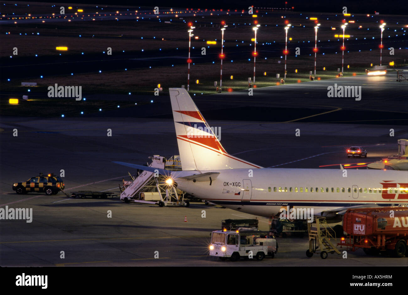 Airplane being repaired overnight Stock Photo - Alamy