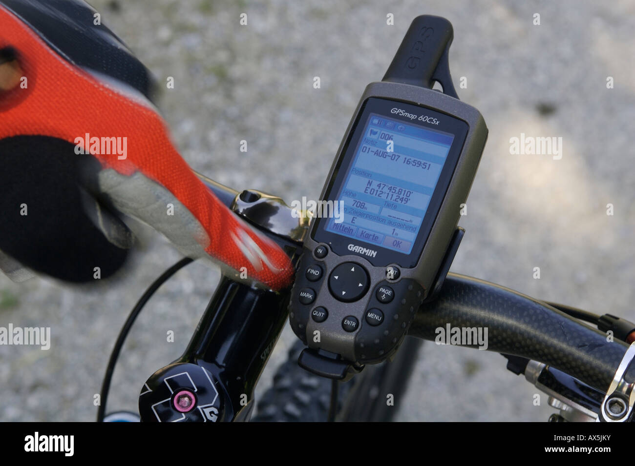 Mobile GPS unit on mountain bike handlebars, saving a position