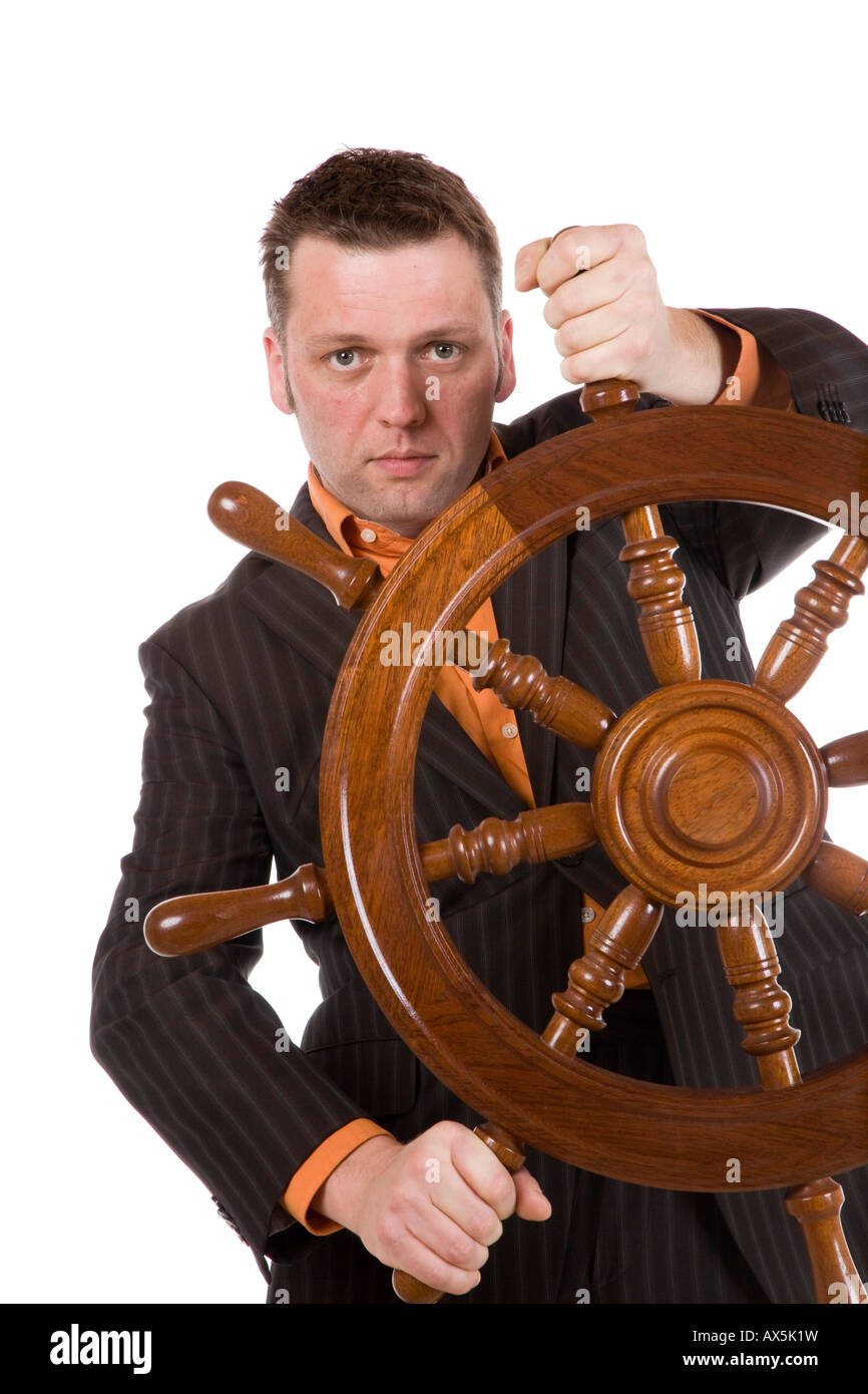 Manager with a steering wheel Stock Photo Alamy