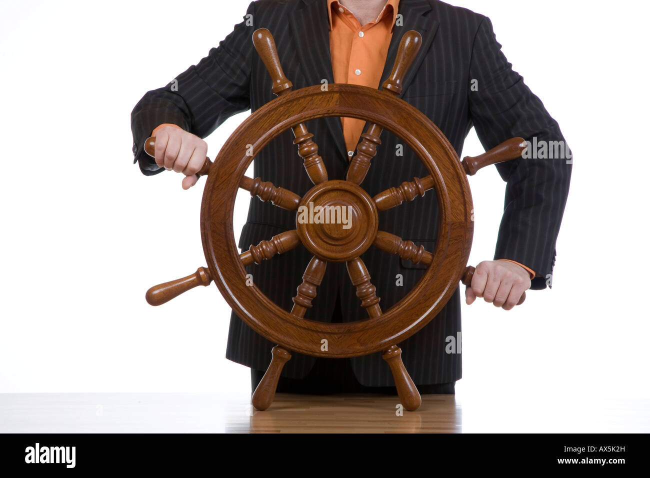 Manager with a steering wheel Stock Photo