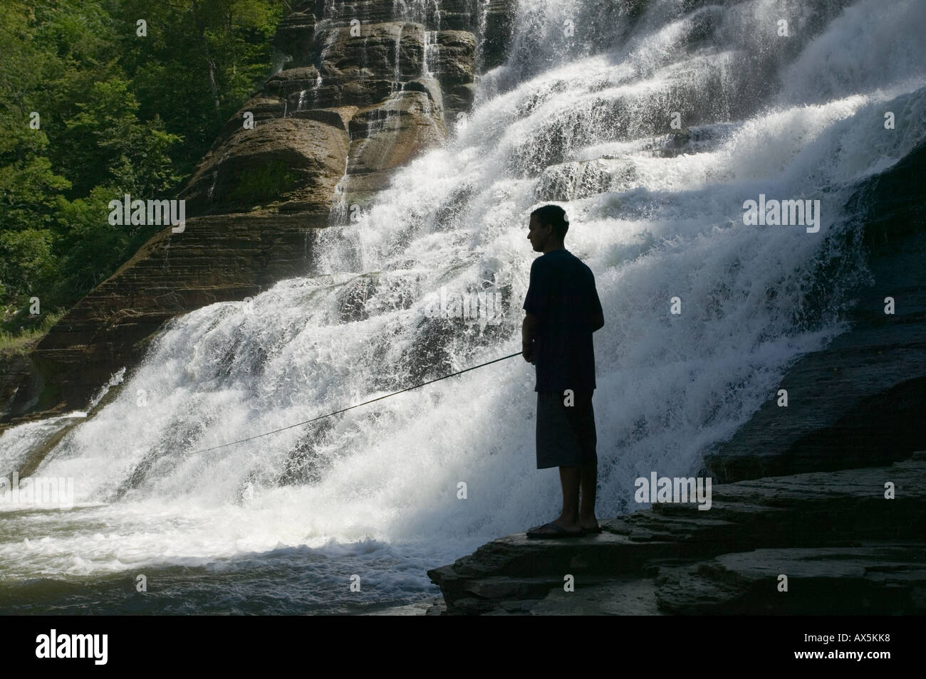 Boy fishing Ithaca Falls New York Finger Lakes region Stock Photo - Alamy