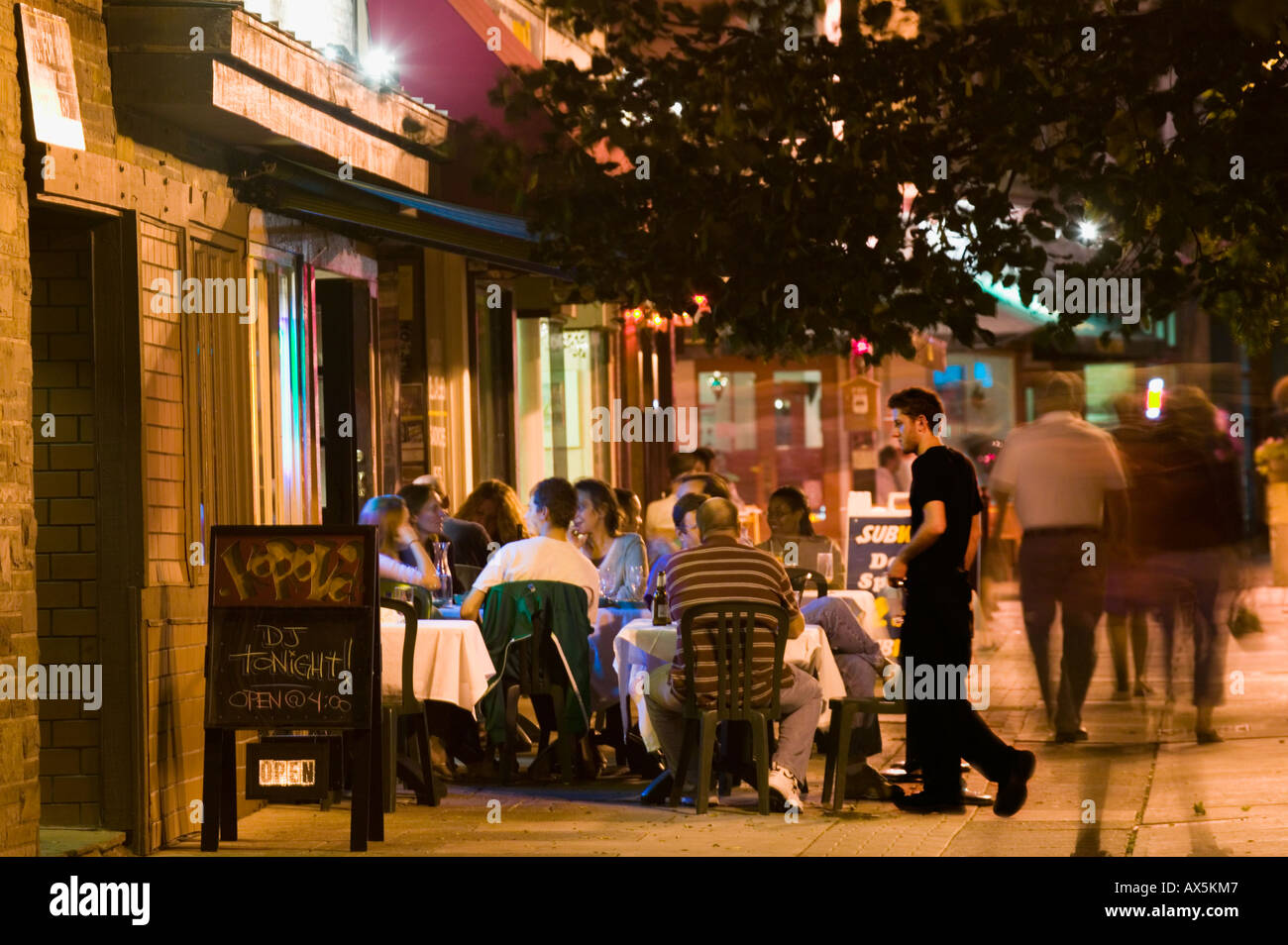 Group of friends at outdoor restaurant cafe Downtown Commons Ithaca New York Finger Lakes Region Stock Photo