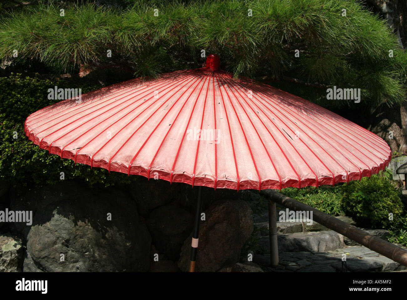 Red paper and bamboo parasol umbrella in Kyoto, Japan Stock Photo