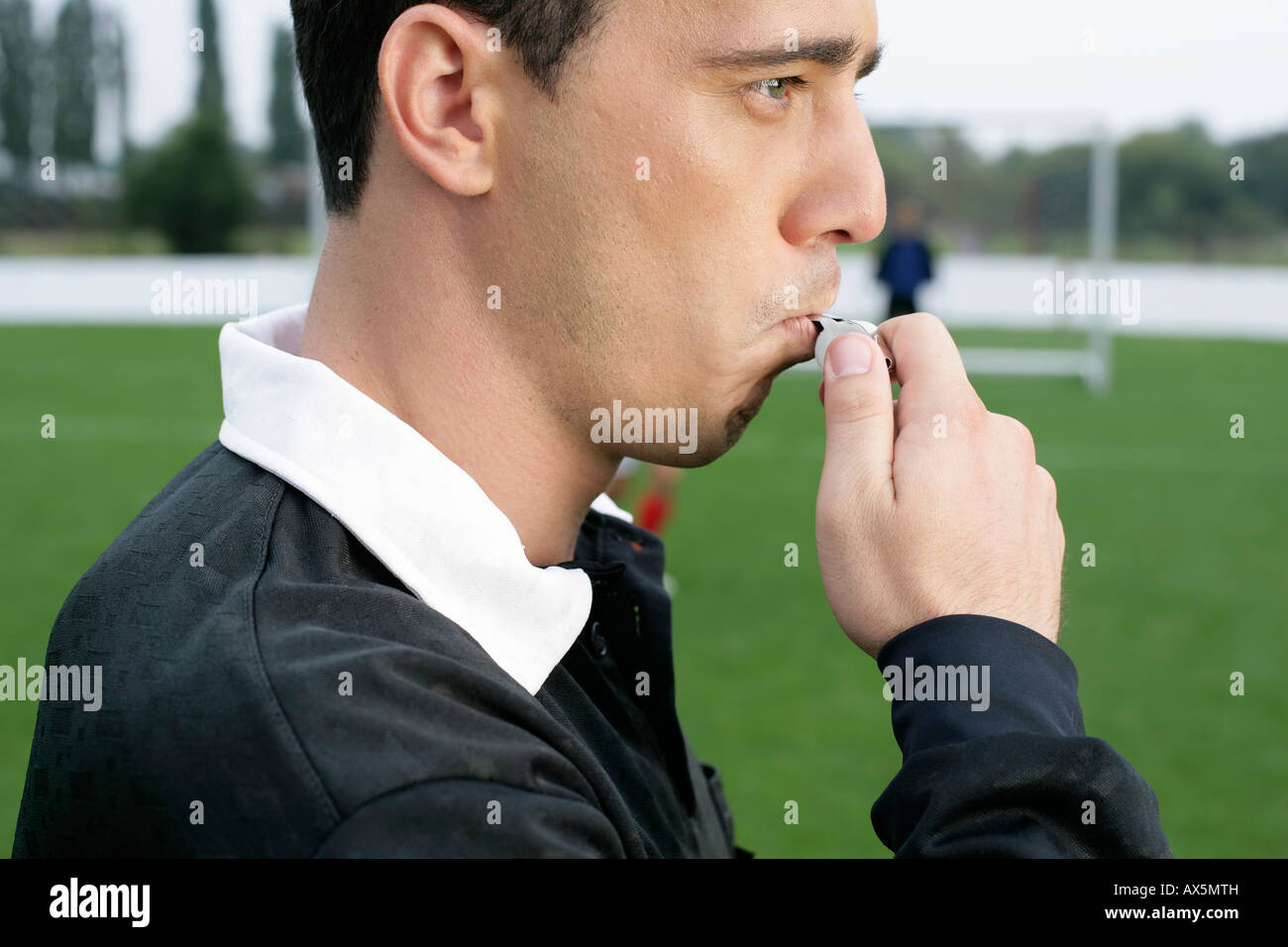 Referee Blowing Whistle High Resolution Stock Photography and Images
