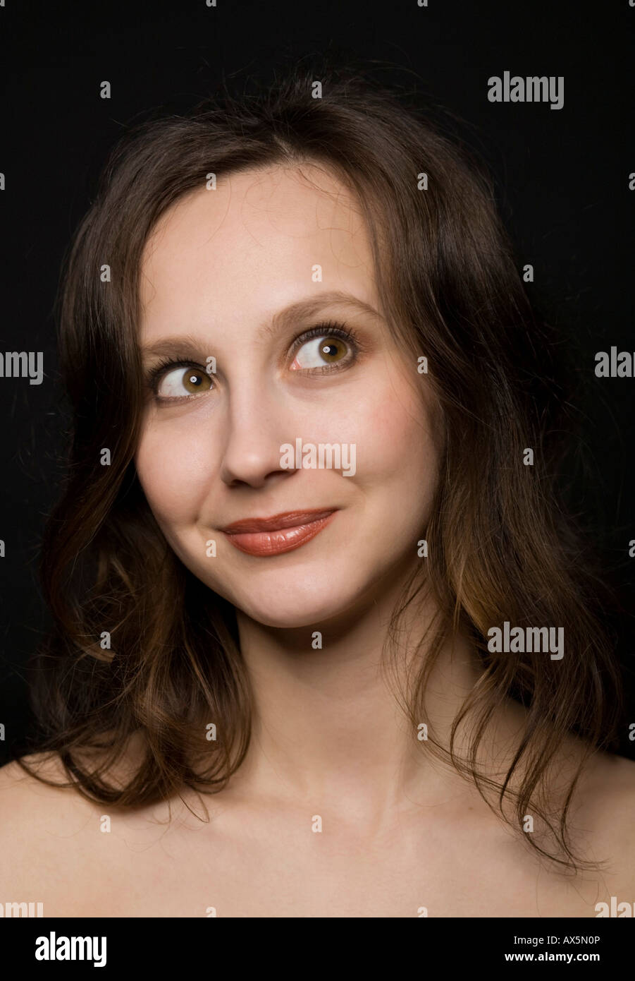 Portrait of a smiling young woman Stock Photo