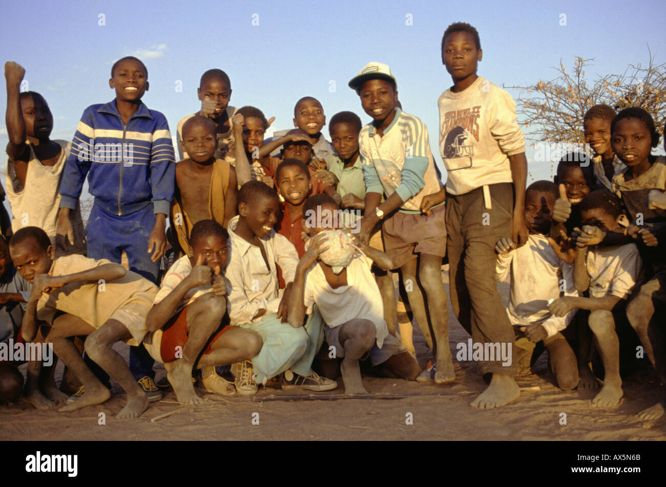 Dodoma, Tanzania. Group of children, one holding a home-made ball. Stock Photo