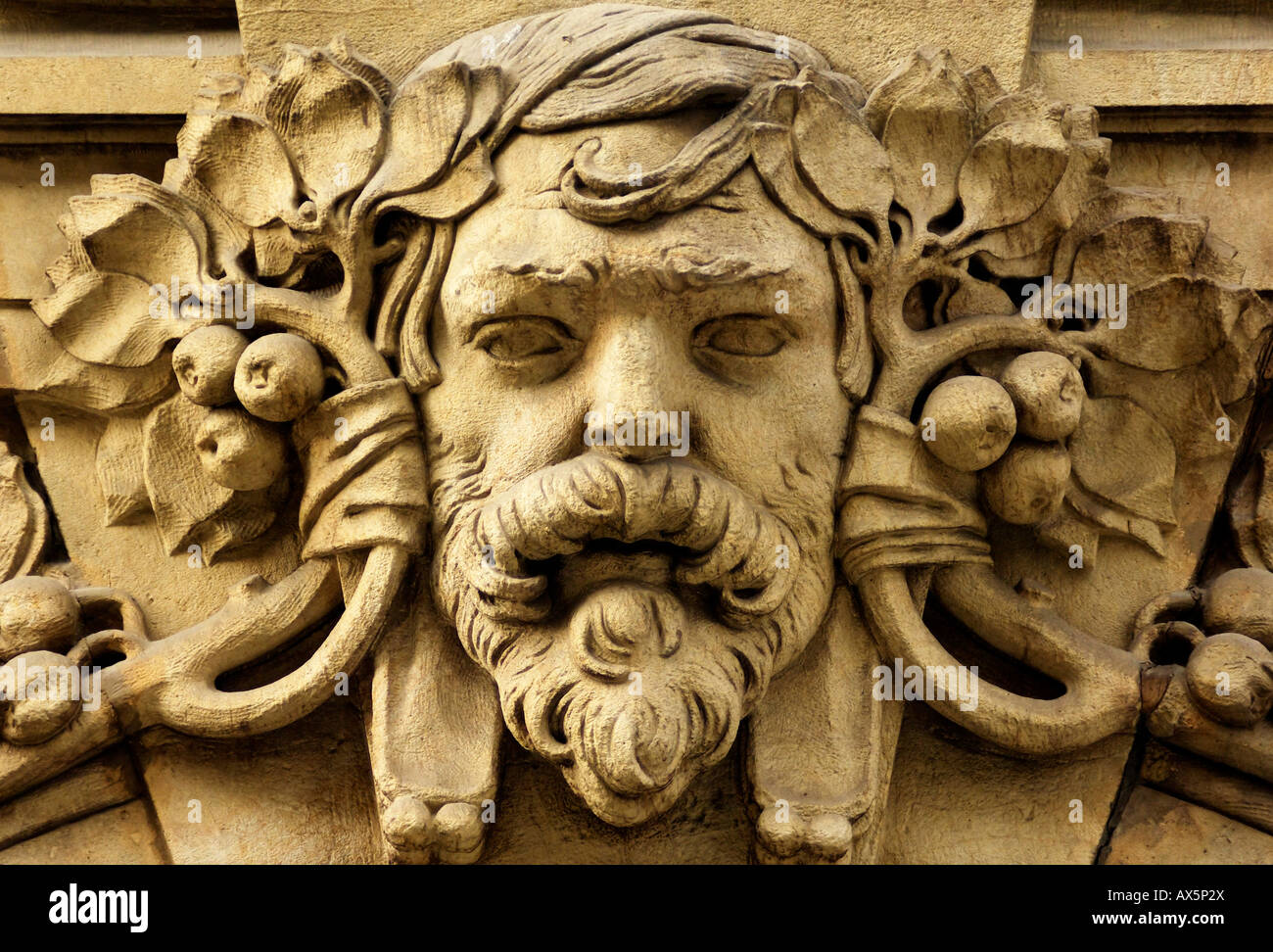 Stone face on a building facade in the historic centre of Prague, Czech Republic, Europe Stock Photo