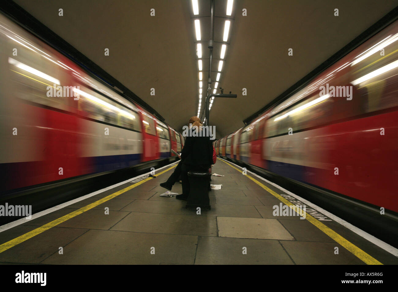 Departing trains and waiting passengers at Clapham South underground station, London, England, UK, Europe Stock Photo