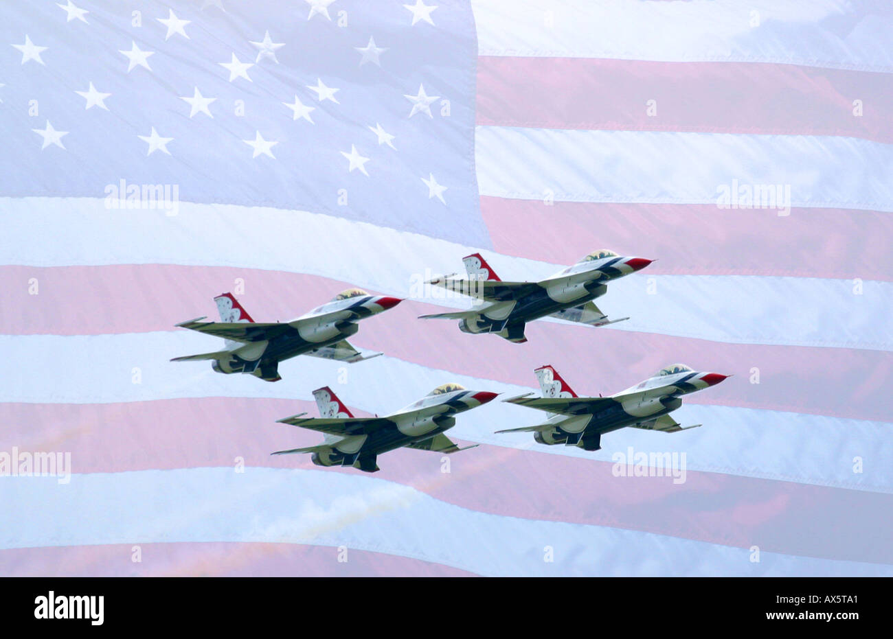 The Airforce Thunderbirds flying through the Stars and Stripes Stock Photo