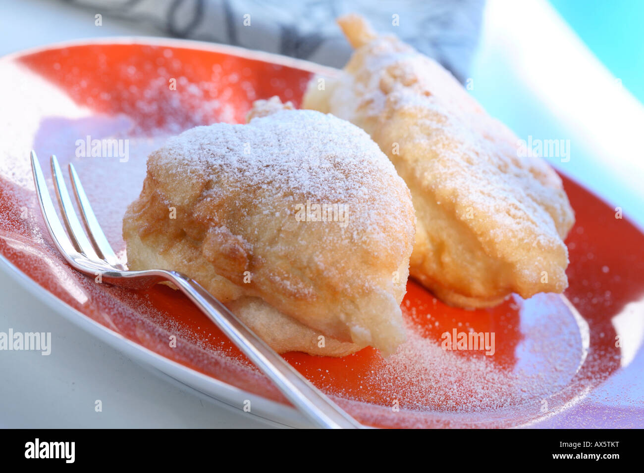 Two bismarcks with icing sugar Stock Photo