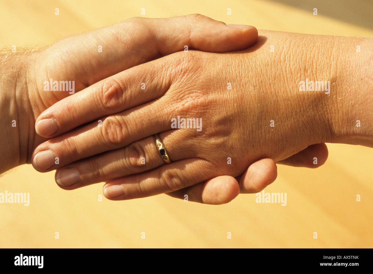 Hands touching Stock Photo