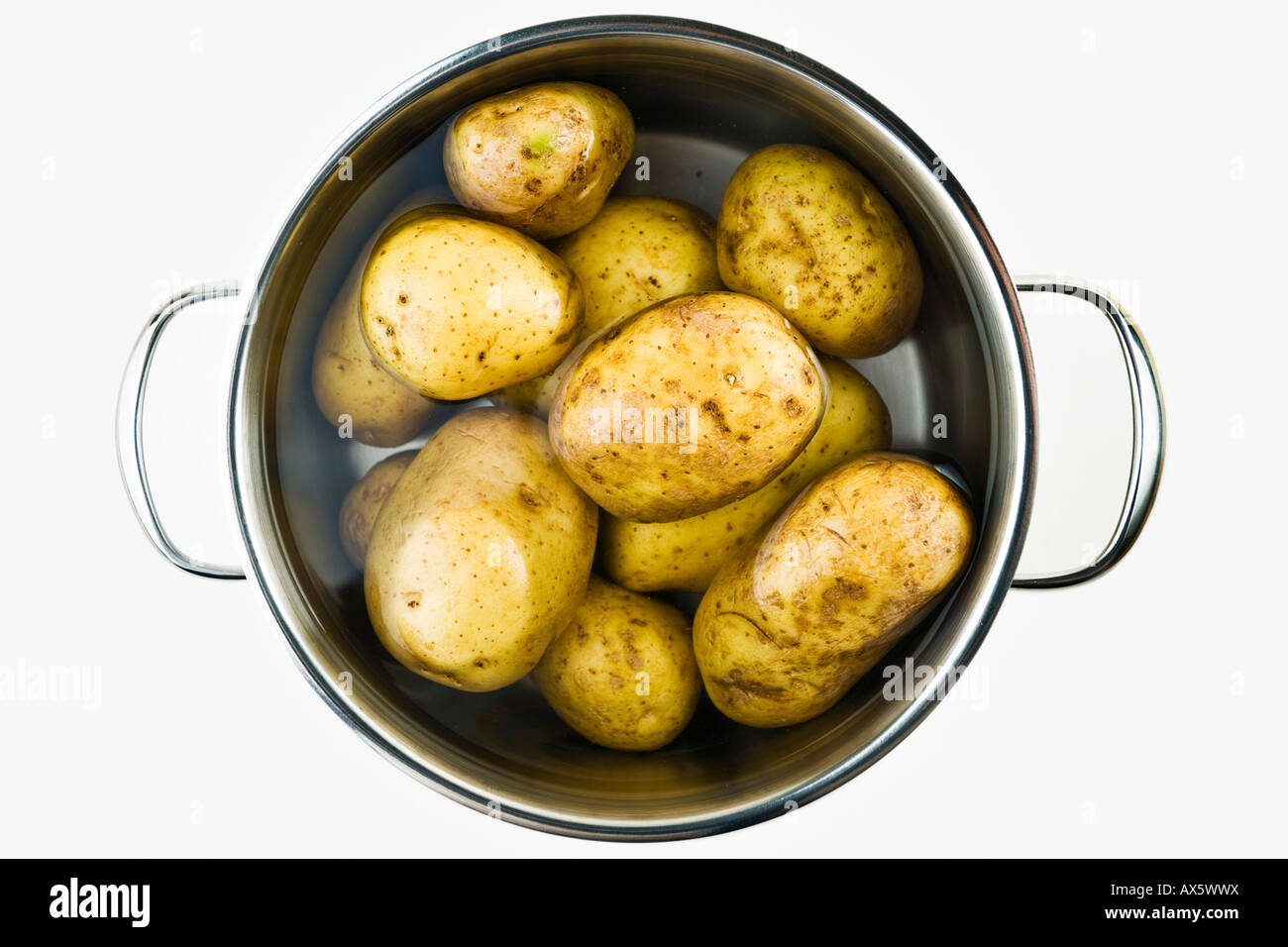 Potatoes in a pot of water Stock Photo Alamy
