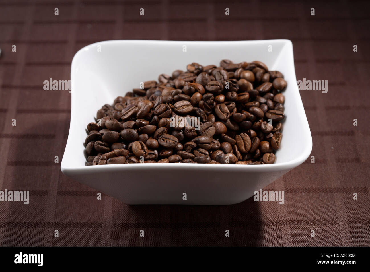 Bowl with coffee beans Stock Photo