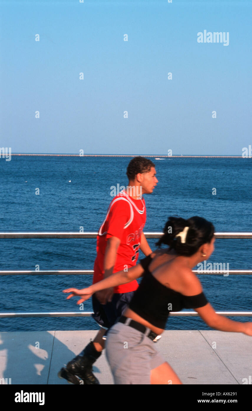 Two rollerblader at Lake Michigan shore, Milwaukee Wisconsin USA, August 2003 Stock Photo