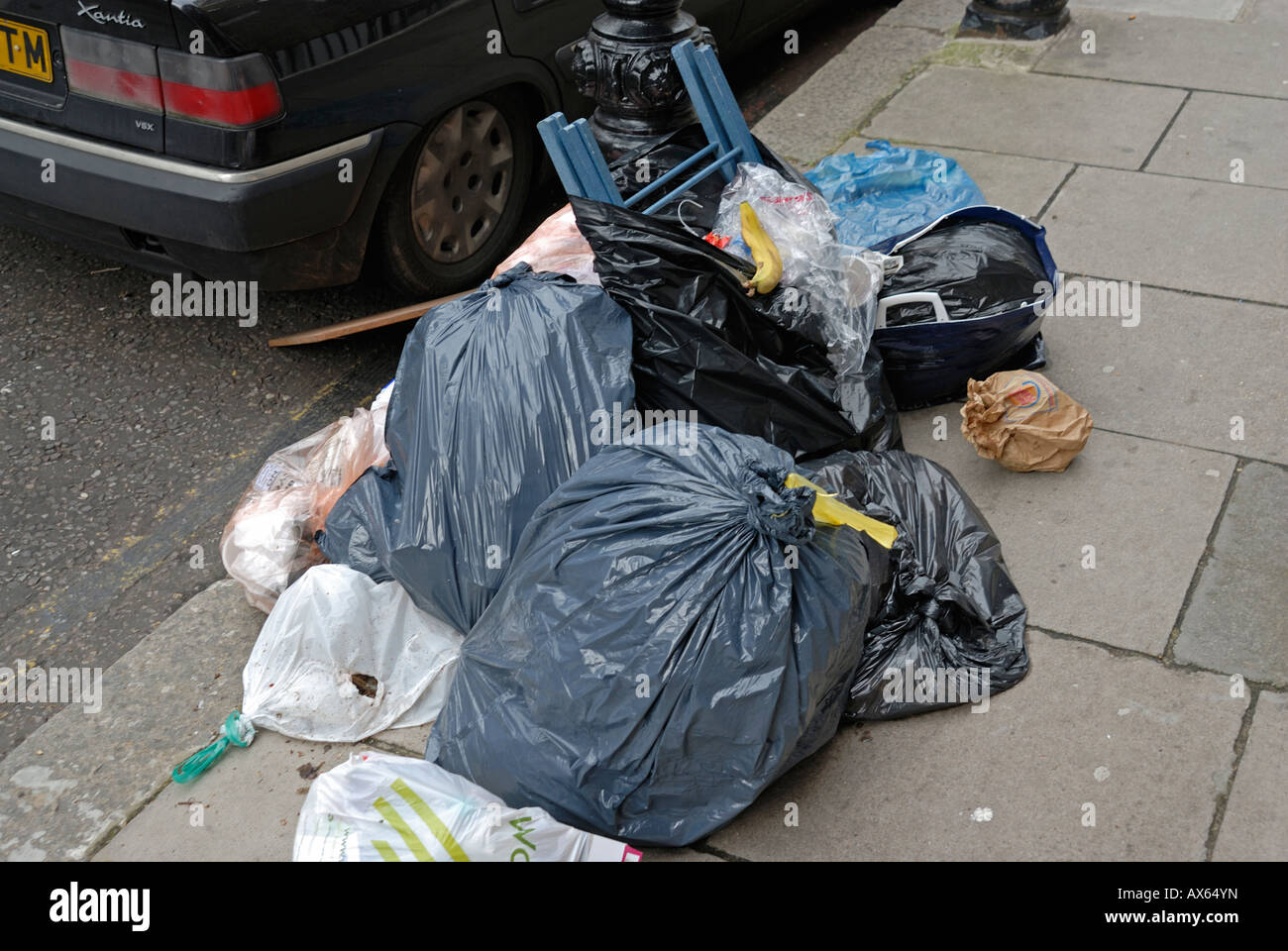 Rubbish awaiting collection, London street Stock Photo Alamy