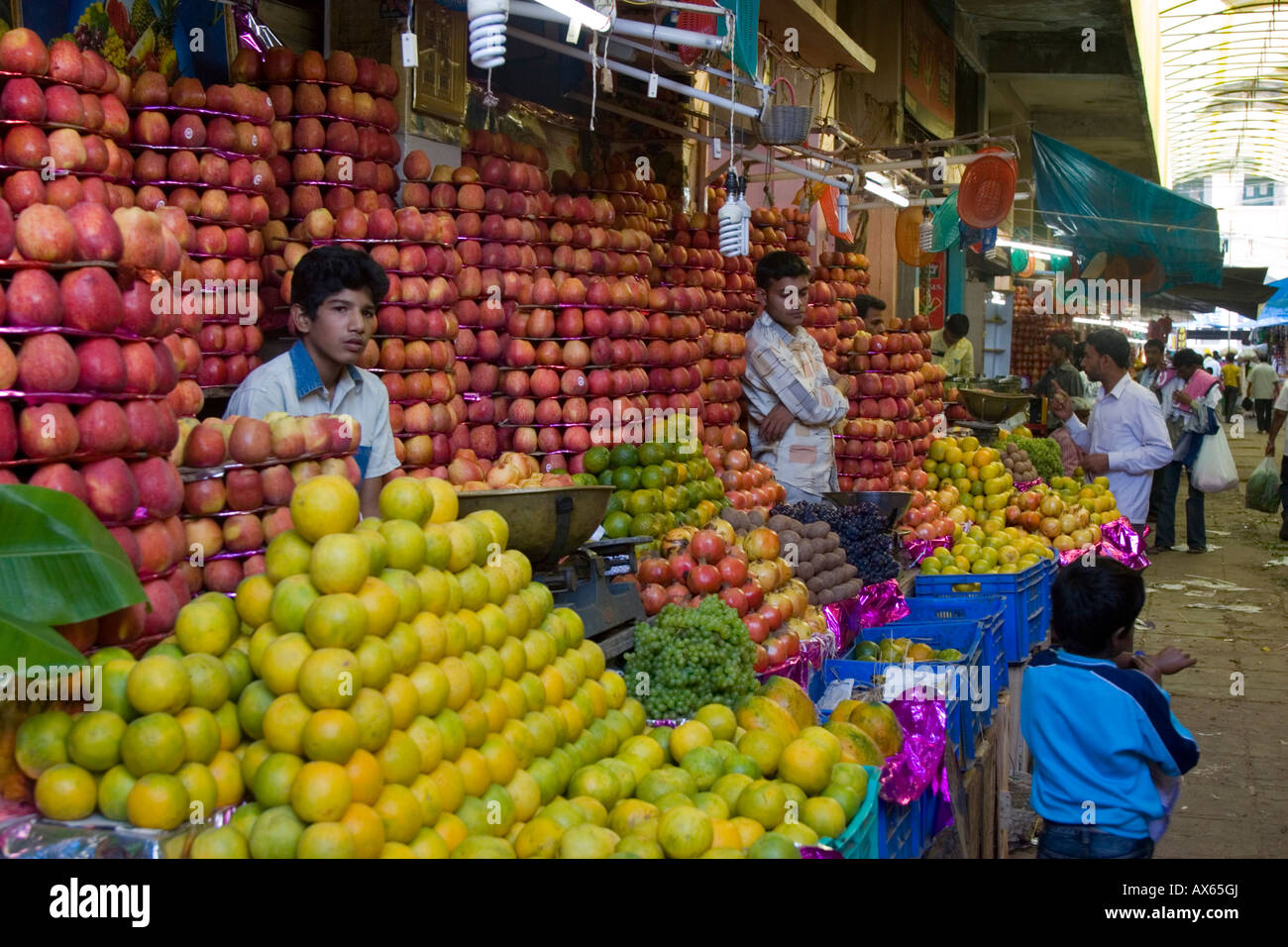 Mysore fruit market with various apples and citrus fruits piled high