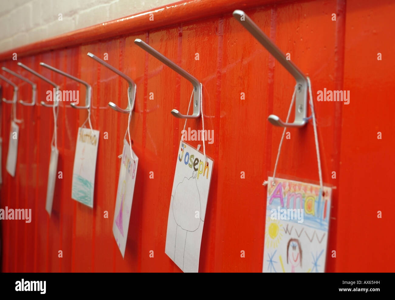 children's junior school coat hooks Stock Photo