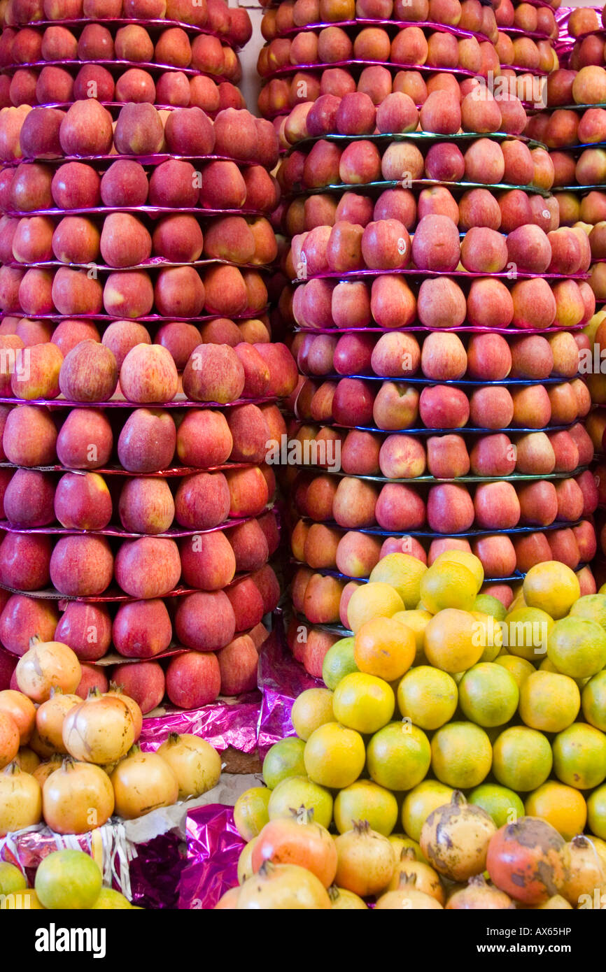 Mysore fruit market with various apples and citrus fruits piled high