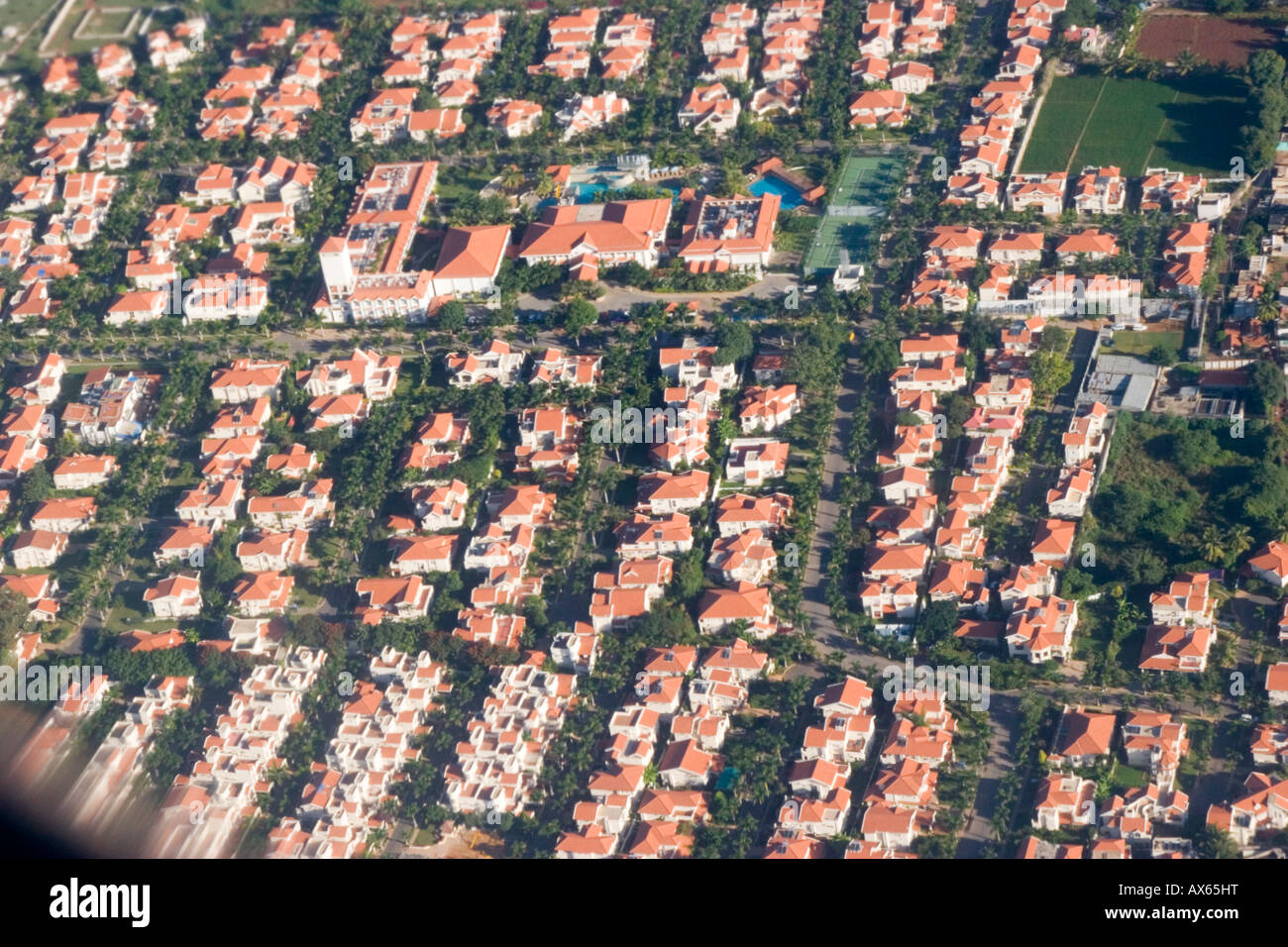 View from aeroplane window of an affluent suburb of Banaglore many swimming pools and tennis courts Stock Photo