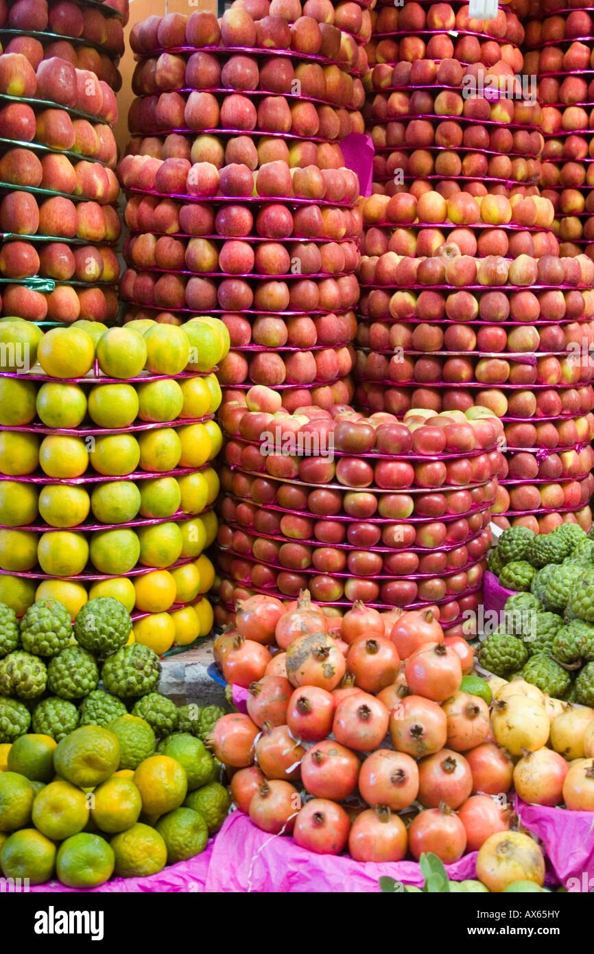 Mysore fruit market with various apples and citrus fruits piled high
