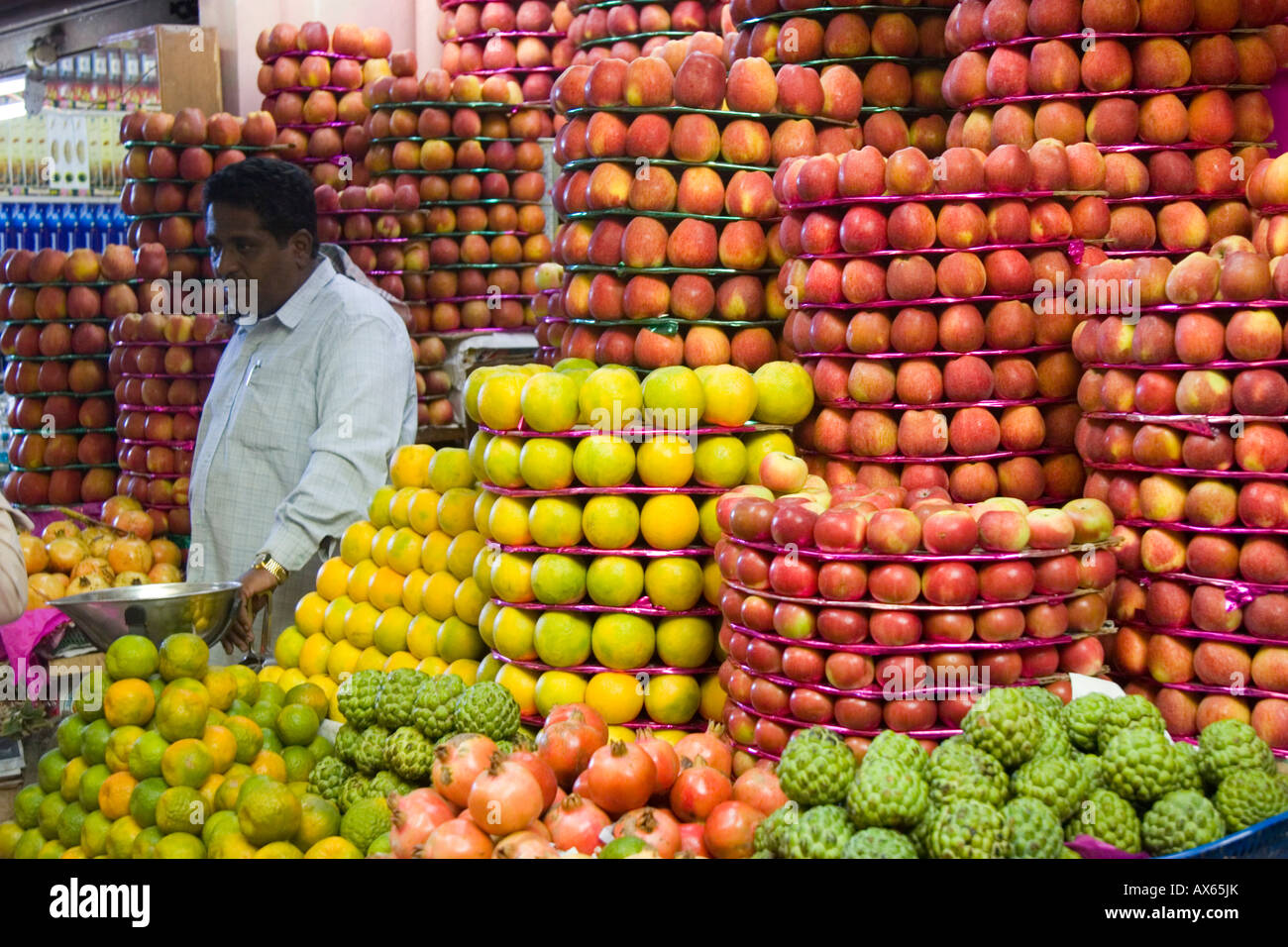 Mysore fruit market with various apples and citrus fruits piled high