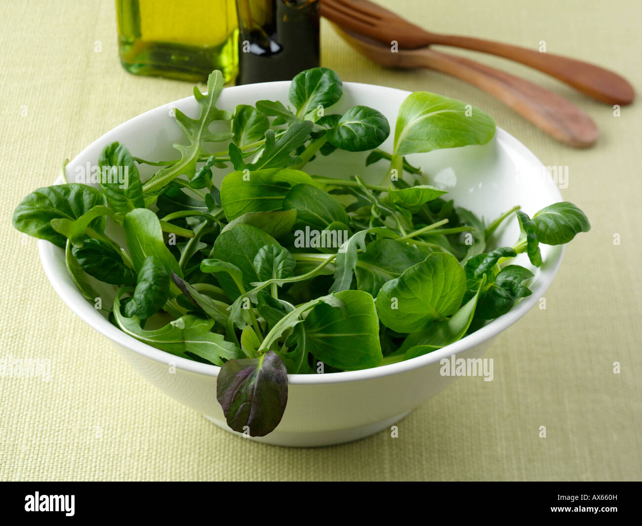 Green salad leaves rocket red chard red frills baby pak choi tatsoi spinach coriander mustard leaves editorial food Stock Photo