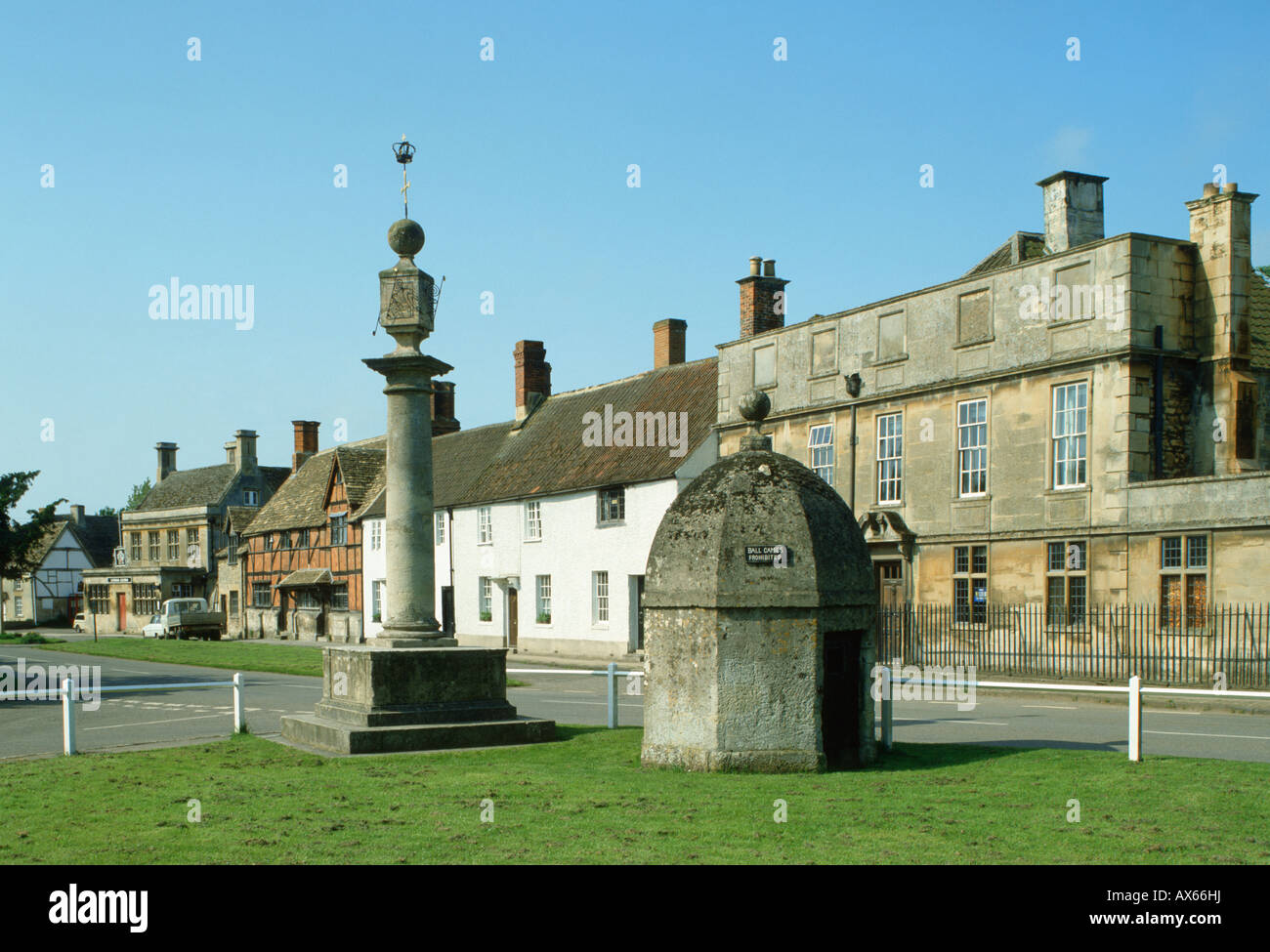Steeple Ashton village green, sundial and lockup, Wiltshire, UK Stock