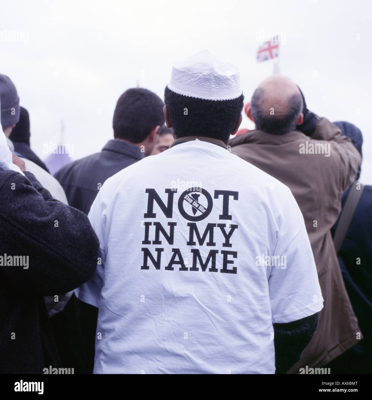 Muslim man wearing a 'Not In My Name' T shirt at the Hyde Park, London, anti Iraq war rally on the 15 February 2003 KATHY DEWITT Stock Photo