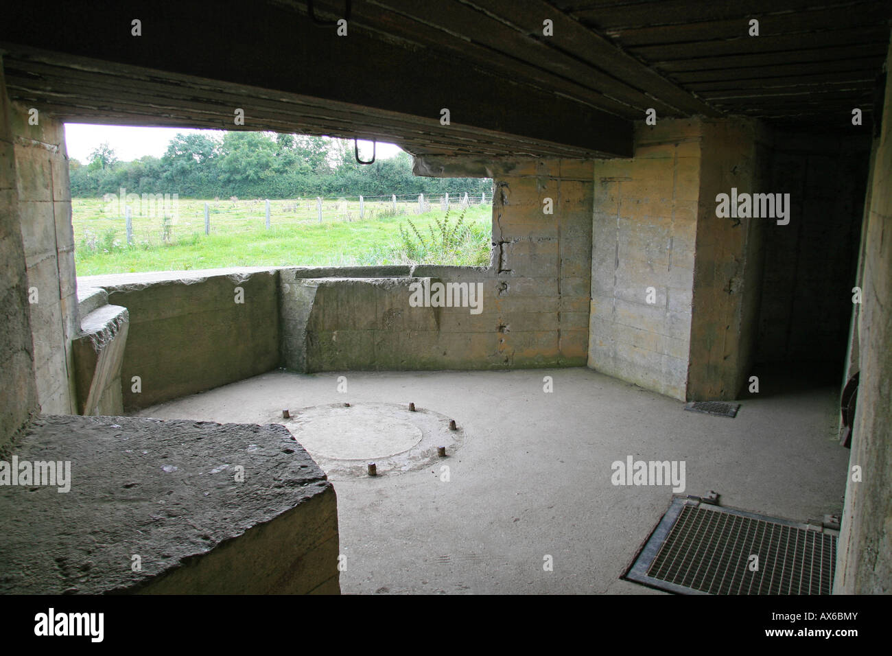 Inside a relatively undamaged artillary gun emplacement at the German Battery at Azeville, Normandy. Stock Photo