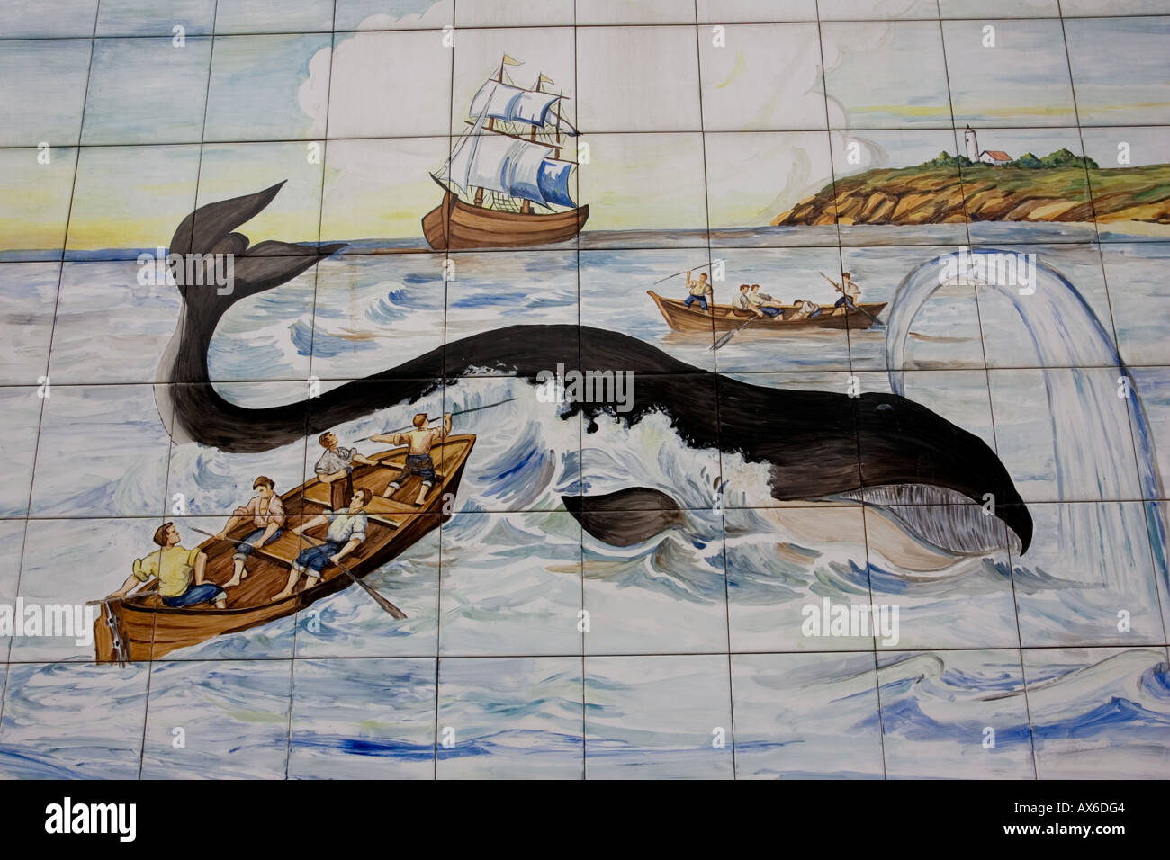 Mural of small Spanish whaling boat harpooning whale on wall of harbour Luarca Costa Verde Northern Spain Stock Photo