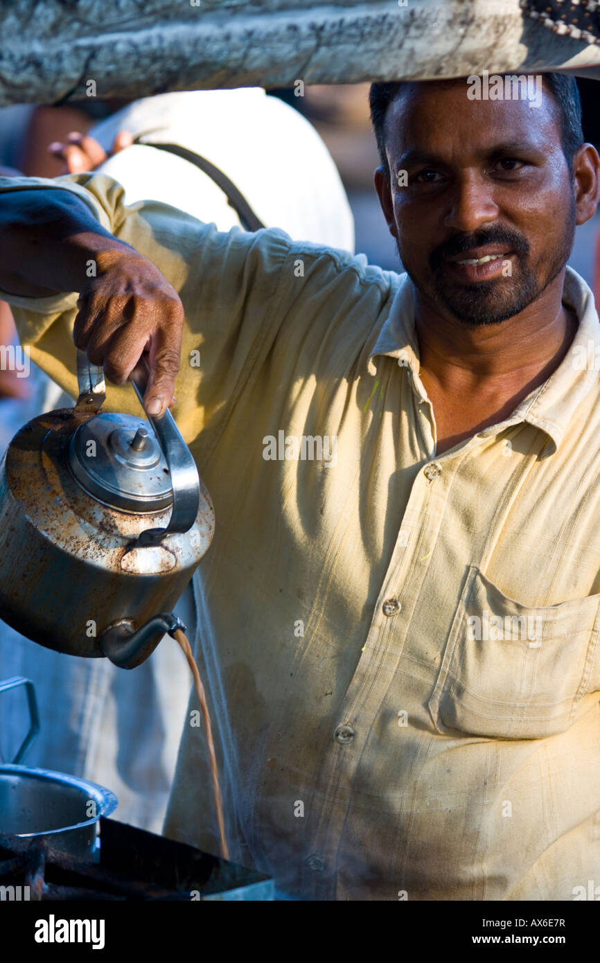 Chai Vendor Pouring Tea in Cochin India Stock Photo Alamy