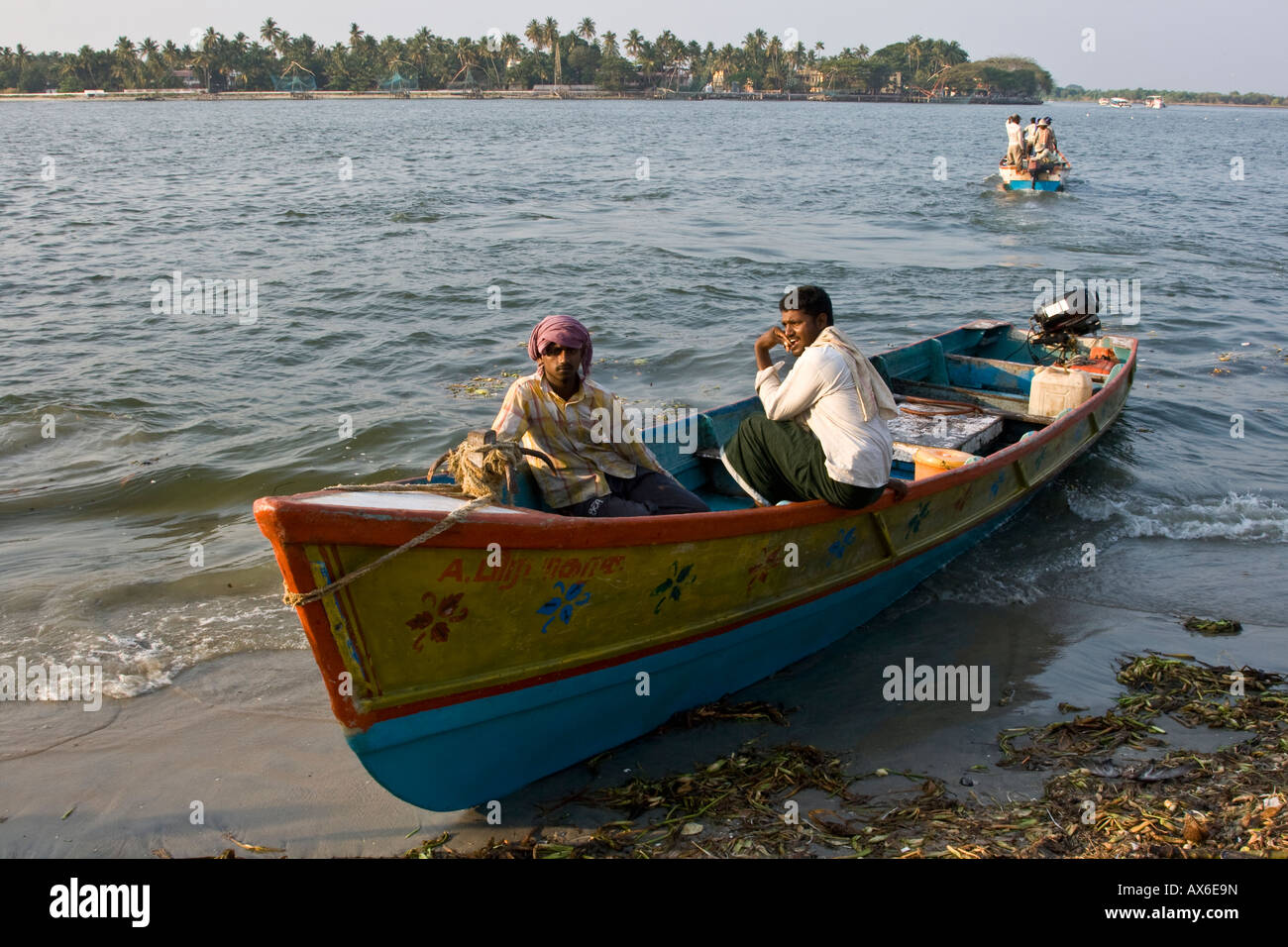 Indian man in small boat hi-res stock photography and images - Alamy