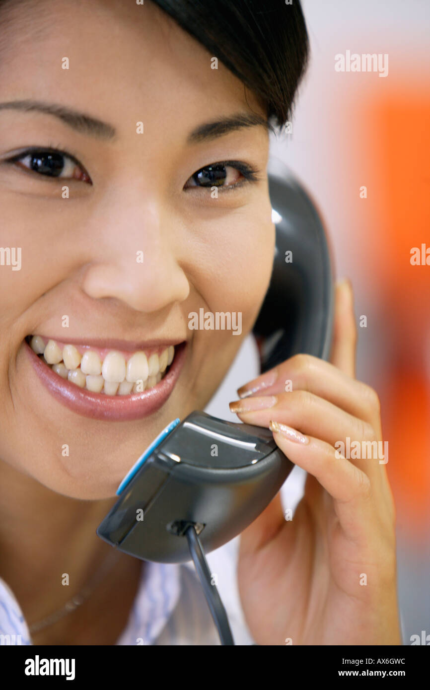 A portrait of a woman conversing on the telephone Stock Photo - Alamy