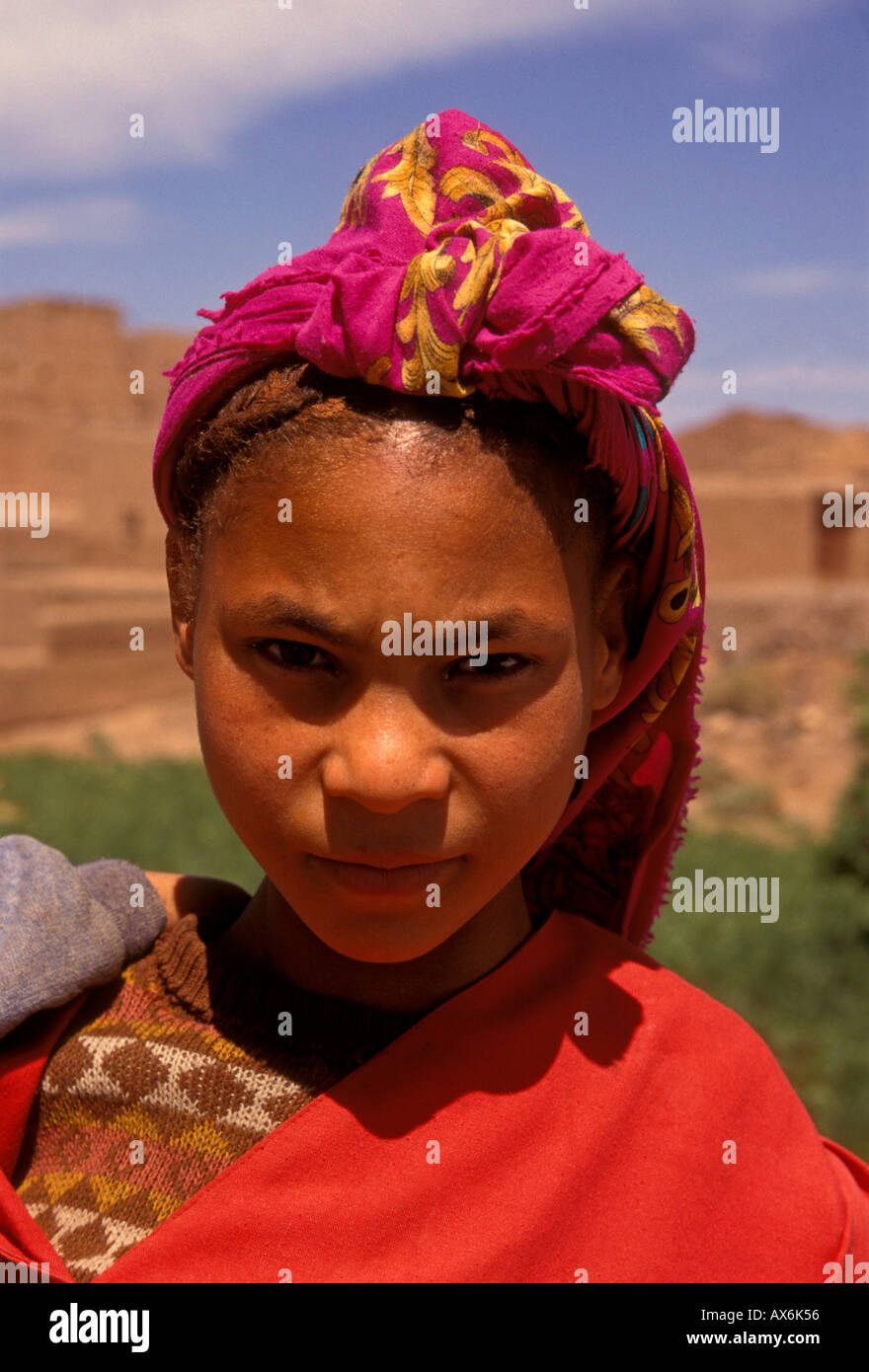 1, one, Moroccan girl, Moroccan, girl, young girl, female child, child, eye contact, front view, Skoura, Dades Valley, Morocco, Africa Stock Photo