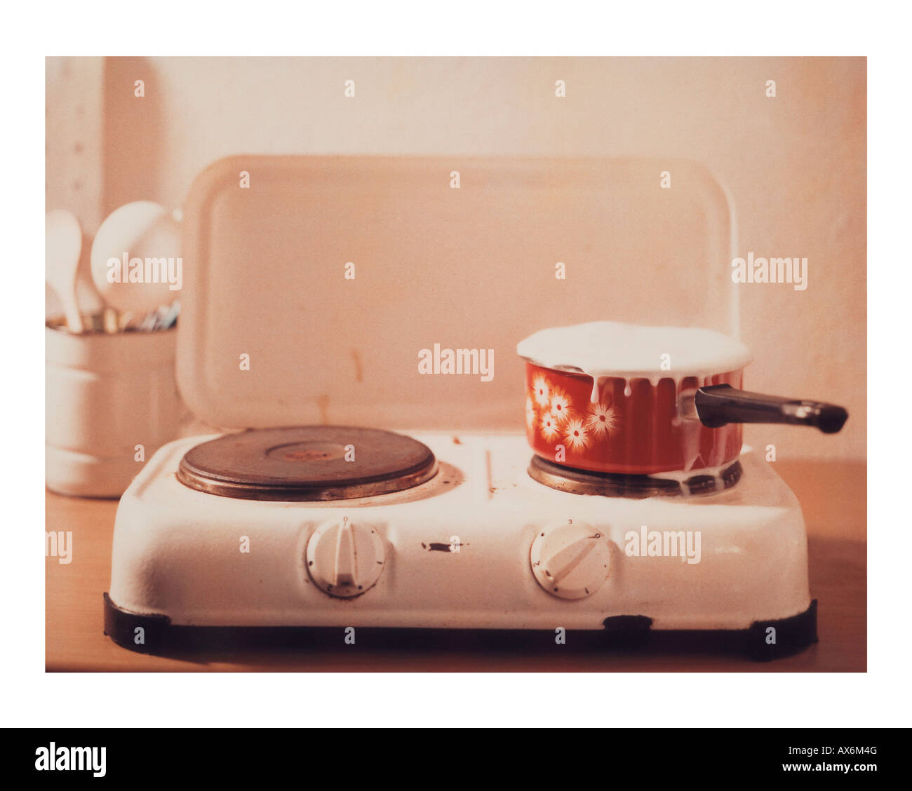 Milk pot on cooker stock photo. Image of surging, boiling - 39511230