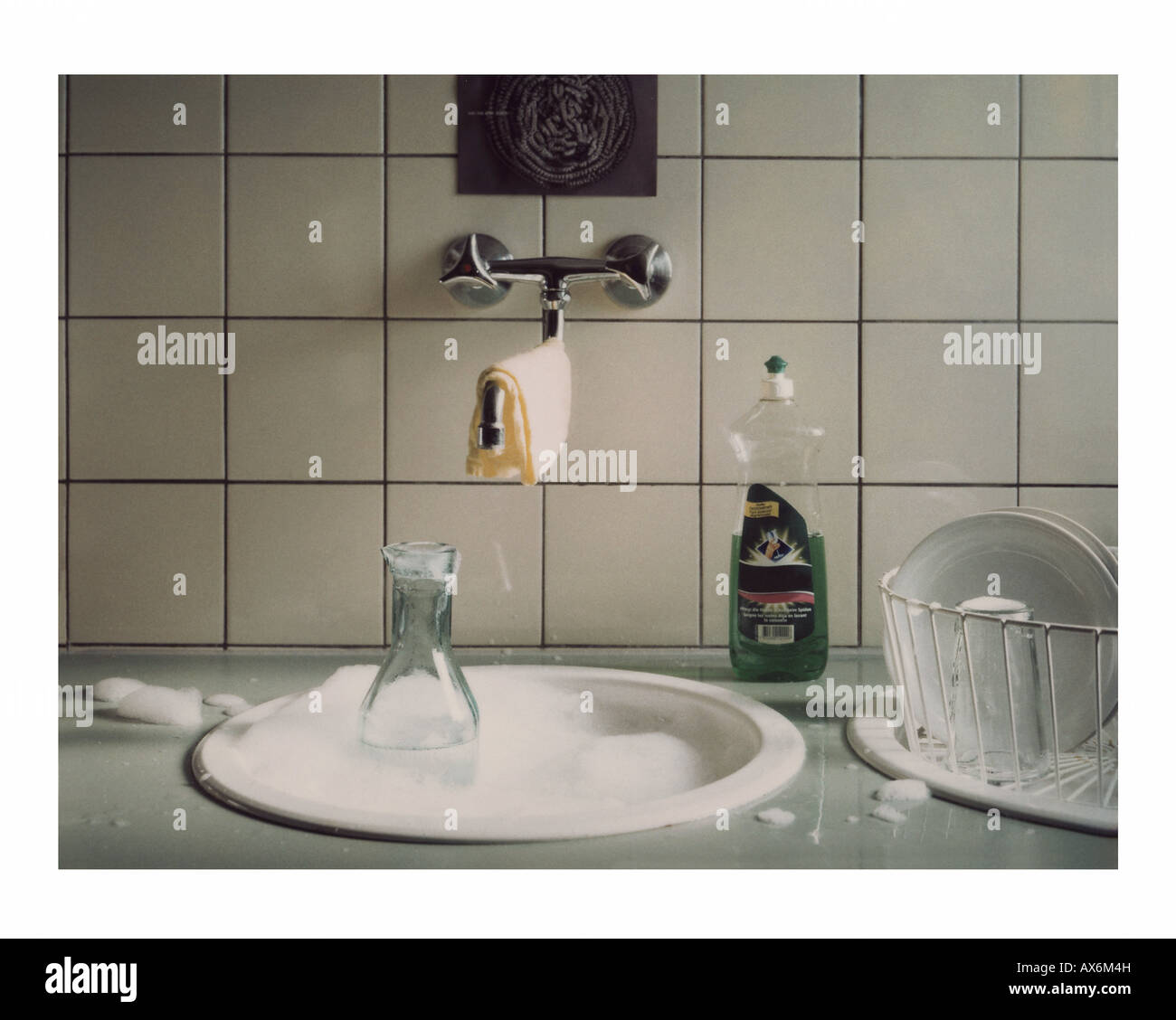 Dishwashing liquid at kitchen sink Stock Photo Alamy