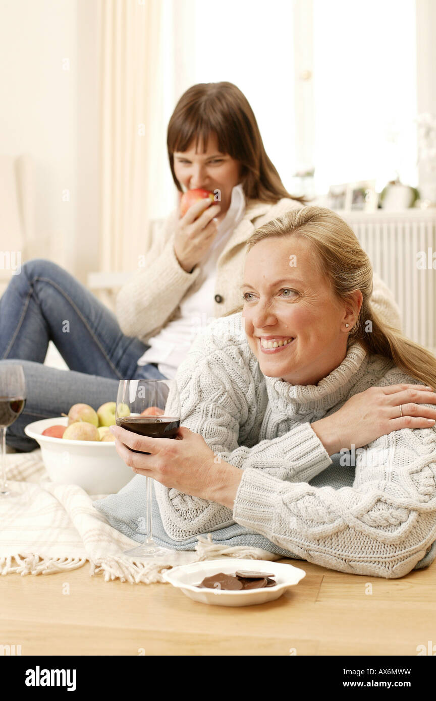 Woman holding glass of wine hi-res stock photography and images - Alamy