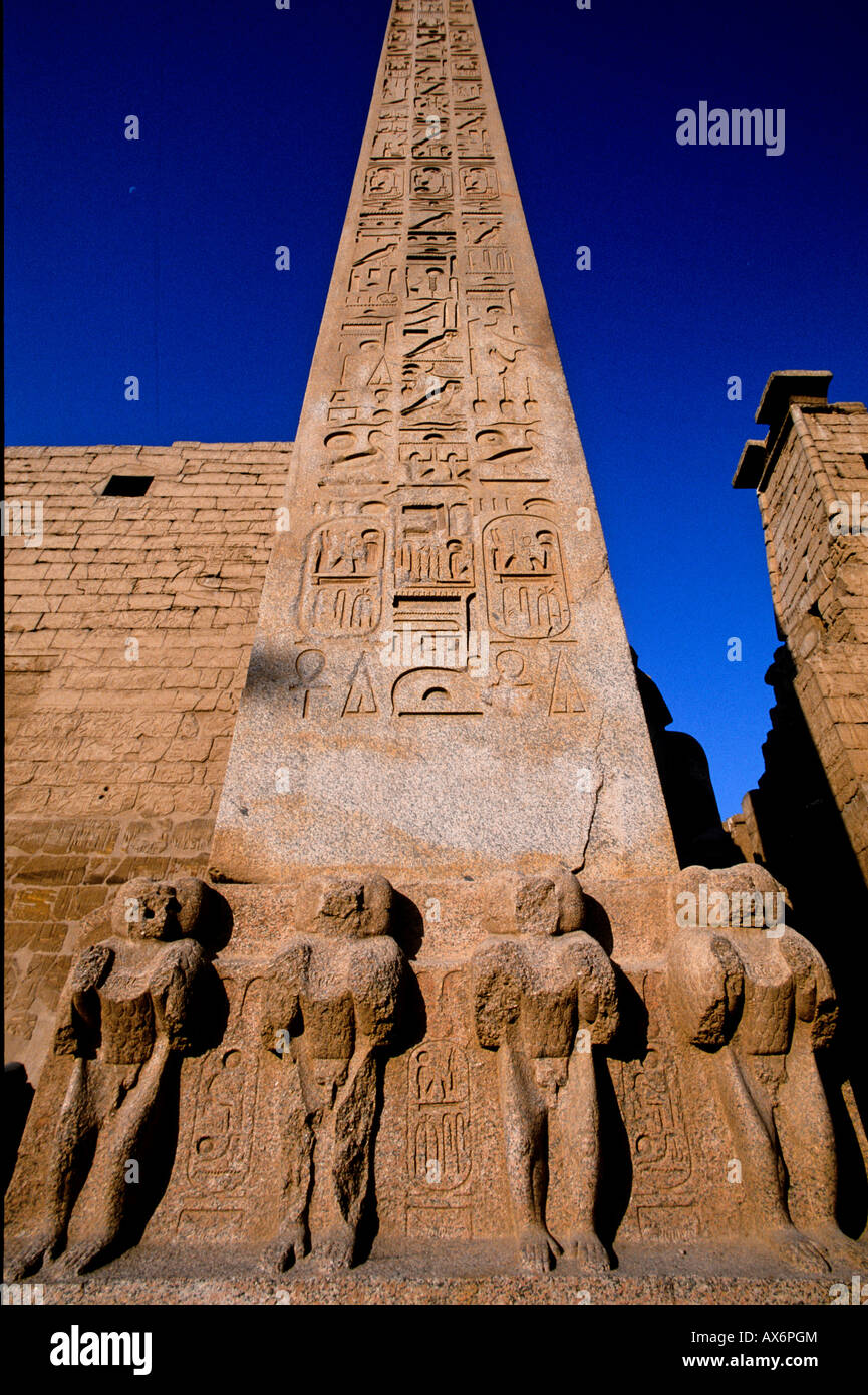 Low angle view of Egyptian sculptures against clear blue sky, Luxor, Egypt Stock Photo