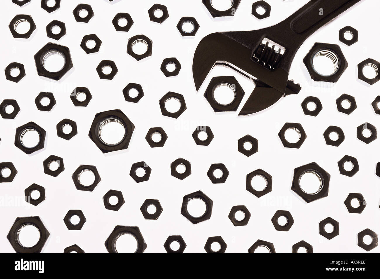 Wrench and different size bolts Stock Photo Alamy