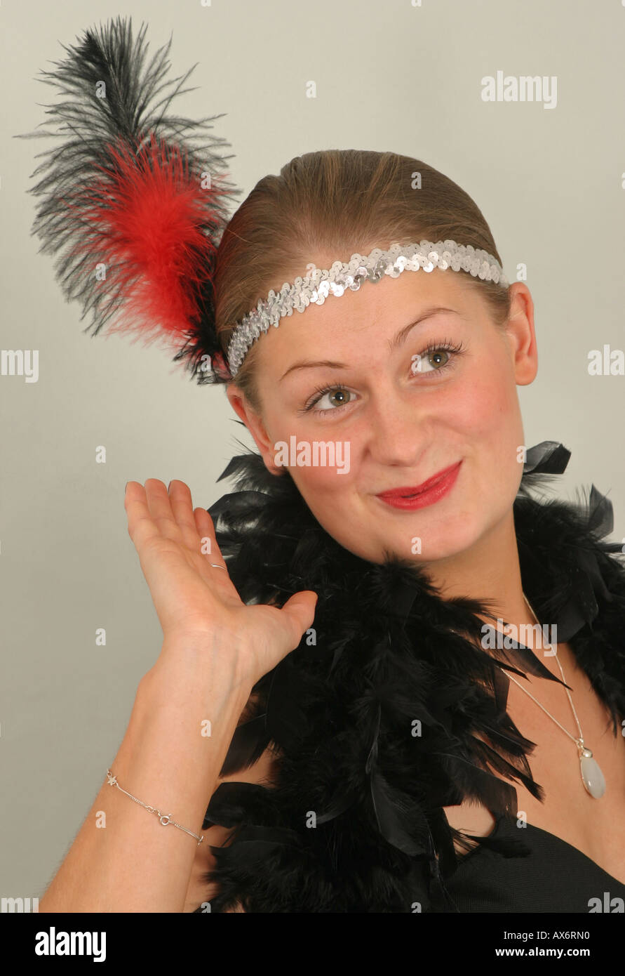 Beautiful Vintage 1920s Lady Wearing A Headband And White Feather Boa Stock  Photo, Picture and Royalty Free Image. Image 30603487.