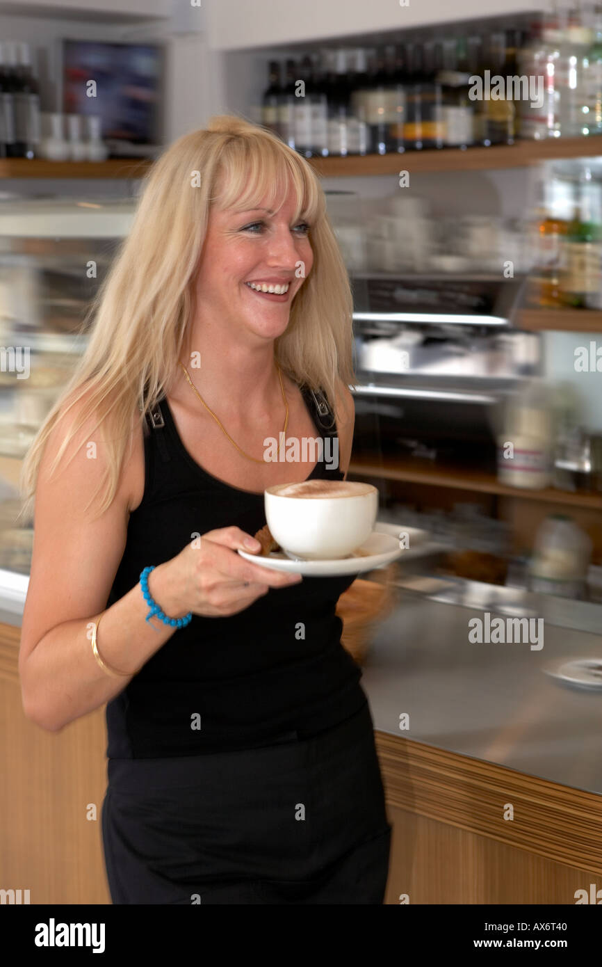 Waitress serving coffee in Hull Stock Photo Alamy