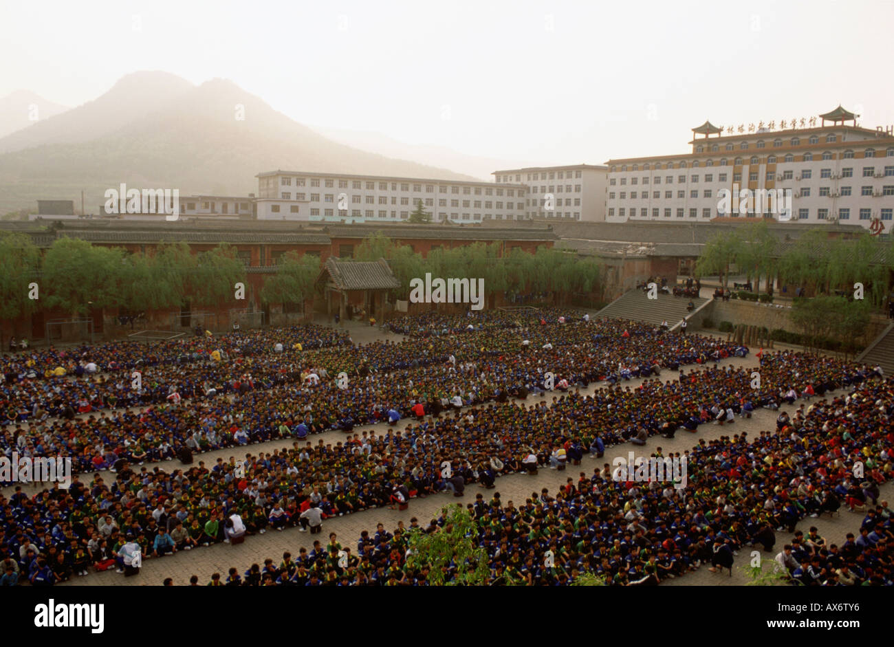 Chinese kung fu students practice synchronized kung fu at the Ta Gou