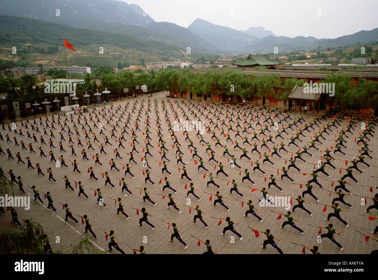 Chinese kung fu students practice synchronized kung fu at the Ta Gou